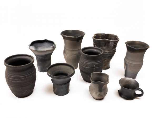Dark medieval ceramic cups