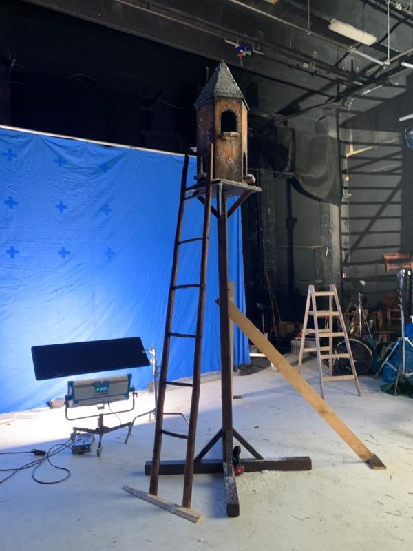 wooden dovecot on extra large pedestal for set of commercial or movie